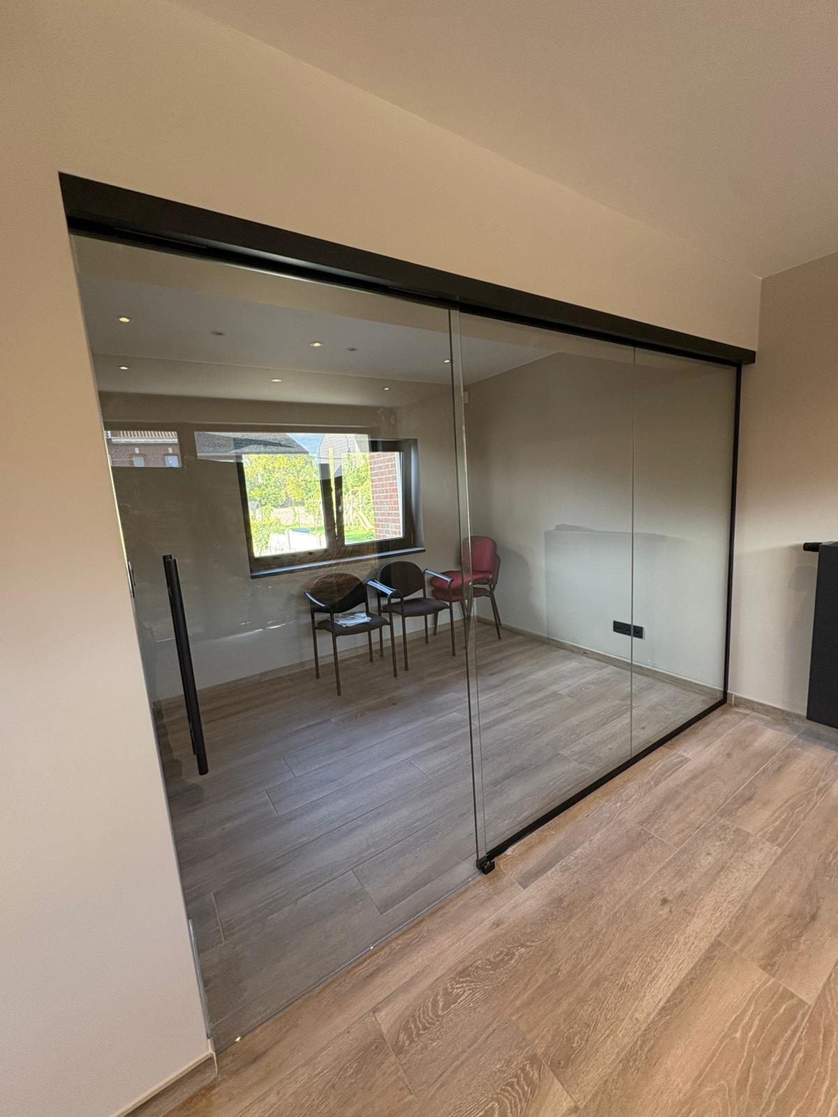 Porte coulissante en verre